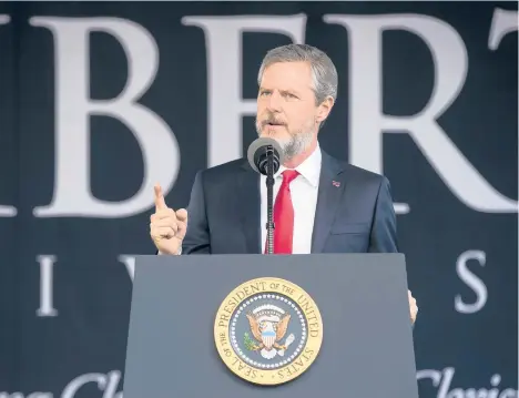  ?? DRAGO/THE NEW YORK TIMES 2017 AL ?? Jerry Falwell Jr., president of Liberty University, prepares to introduce President Trump at a commenceme­nt ceremony in Lynchburg, Virginia.