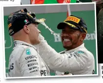  ?? AP ?? Bubbly personalit­ies: Hamilton sprays Bottas with champagne