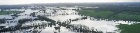  ?? PHOTO: BRIAN GAVIN PRESS 22 ?? Flooding as far as the eye can see in Clonlara, Co Clare last January. The EPA repdict that extreme weather events such as last winter’s floods in the west are likely to increase in frequency and intensity