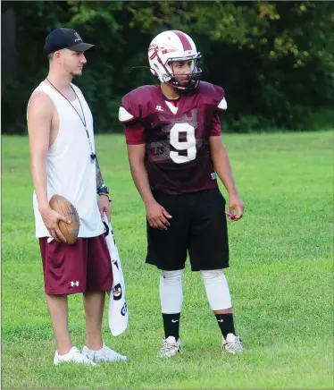  ?? File photo by Ernest A. Brown ?? Woonsocket coach Charlie Bibeault (left) took advantage of the RIIL’s rule allowing joint practices when the Villa Novans welcomed Tolman to Barry Field on Tuesday. Area coaches feel the new rule is helping their teams.