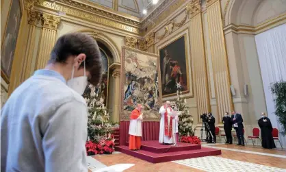  ??  ?? Pope Francis delivers the ‘Urbi et Orbi’Christmas message in the Vatican, instead of the central balcony of St Peter’s Basilica before tens of thousands. Photograph: Vatican Media Handout/EPA