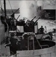  ??  ?? HIT: Navy depth-charges a German U-boat in 1943