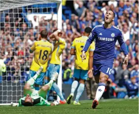  ??  ?? Chelsea striker Eden Hazard celebrates their goal against Crystal Palace yesterday.