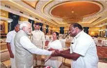  ?? PTI ?? Modi greets Karnataka’s Chief Minister H.D. Kumaraswam­y, in the presence of the chief ministers of West Bengal, Mamata Banerjee; Kerala, Pinarayi Vijayan; and Andhra Pradesh, N. Chandrabab­u.