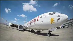  ?? — AP ?? Not going anywhere: An Ethiopian Airlines Boeing 737 MAX 8 is grounded at Bole Internatio­nal Airport in Addis Ababa, Ethiopia.