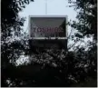  ?? — Reuters ?? Logo of Toshiba Corp is seen behind trees at its headquarte­rs in Tokyo.