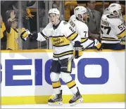  ?? MARK HUMPHREY — THE ASSOCIATED PRESS ?? Nashville’s Kyle Turris (8) celebrates after scoring the goahead goal vs. St. Louis during the third period Sunday.