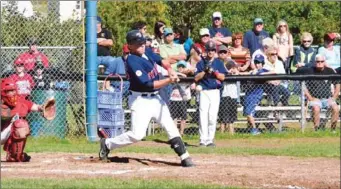  ?? CAPE BRETON POST PHOTO ?? Sydney Sooners catcher Sean Ferguson connected with this pitch and sent it over the left field wall for a second-inning solo home run in his team’s opening game of a double-header against the Kentville Wildcats on Saturday at the Susan McEachern...