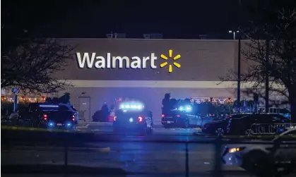  ?? Photograph: Kendall Warner/AP ?? Police at the scene of the mass shooting at a Walmart in Chesapeake, Virginia.