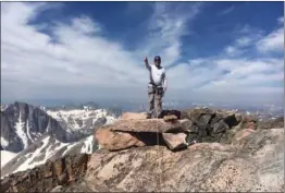  ?? Courtesy photo ?? Ken Curtis on the top of Granite Peak, Montana in July 2017.