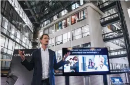  ?? — AFP ?? Hannes Sjöblad, chief disruption officer at Epicenter, Stockholm’s first digital House of Innovation speaks during a chip implant event on January 18. An electronic implant inserted under the skin to replace keys, business cards and train tickets: in...