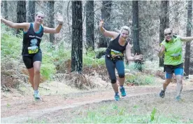  ??  ?? Some runners at a previous event through the Waitarere State Forest.