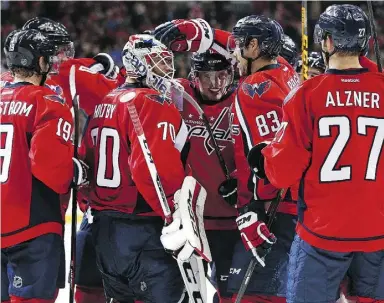  ?? Patrick Smith / Getty Images ?? Goalie Braden Holtby celebrates with his Washington Capitals teammates. The club hopes that the applicatio­n of sports science can help them take another step forward.