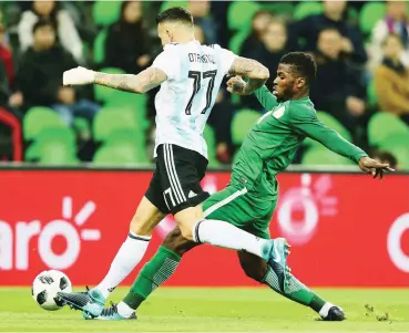  ??  ?? Nigeria's Kelechi Iheanacho and Nicolas Otamendi of Argentina contest for the ball during a recent internatio­nal friendly match between Nigeria and Argentina. Nigeria won 4-2.