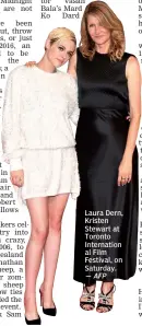  ?? — AFP ?? Laura Dern, Kristen Stewart at Toronto Internatio­n al Film Festival, on Saturday.