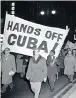  ??  ?? CND members demonstrat­ing during the Cuban Missile Crisis