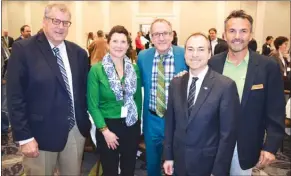  ?? STEVE MACNAULL/The Okanagan Sunday ?? At the Future of the the Okanagan lunch Friday at the Coast Capri Hotel in Kelowna are KelownaMis­sion MLA Steve Thomson, from left, Central Okanagan Economic Developmen­t Commission director Corie Griffiths, City of Kelowna director of business and...