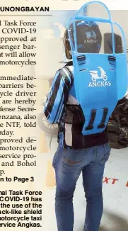  ??  ?? The National Task Force
against COVID-19 has approved the use of the
backpack-like shield proposed by motorcycle taxi
service Angkas.