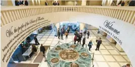  ?? PHIL SEARS/AP ?? The Florida Capitol rotunda is abuzz with people during a special session on Feb. 8 in Tallahasse­e. During that session, lawmakers rewrote laws on Disney’s self-governing district and a program to transport migrants out of Florida to protect the governor.