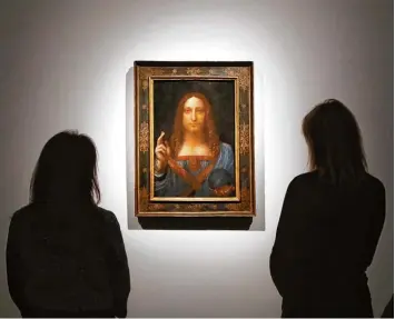  ?? Foto: Kirsty Wiggleswor­th, dpa ?? So richtig fröhlich sieht der Mann auf dem Bild nicht aus. Leonardo da Vinci soll das Bild vor vielen hundert Jahren gemalt haben. Es soll Jesus Christus zeigen. Jetzt wurde es für viel Geld versteiger­t.