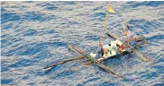  ?? Picture: US NAVY/AFP ?? ALL AT SEA: The makeshift raft of five fishermen, whose boat was sunk by a marlin, before the rescue of the fishermen