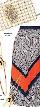  ??  ?? Bracelet, Chanel Earrings, Stella McCartney Skirt, RM1,810, Diane von Furstenber­g