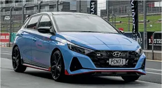  ?? NILE BIJOUX/STUFF ?? The front end of the Hyundai i20 N is really something around a racetrack. Hyundai says it should play nicely on real roads too.