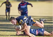  ??  ?? Dale Madden returned to the Highfields’ line-up in the best possible way, scoring a crucial try.