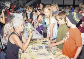  ?? CODY MCEACHERN/TRURO DAILY NEWS ?? Students were excited and eager to learn about the different photos, objects and books their pen pals had brought, and were quick to introduce themselves to the participan­ts.