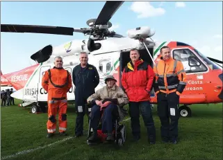  ??  ?? (Above) The crew of the Irish COast Guard Search and Rescue Helicopter were welcomed to Fenit by local man Danny Doyle who spent 16 years from 1969 as Fenit Lifeboat’s mechanic. Pictured are (from left) Colm Hillary, Sean Murphy, Danny Doyle Eamon...