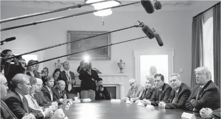  ??  ?? U.S. President Donald Trump meets with U.S. steel and aluminum executives in the Cabinet Room of the White House.