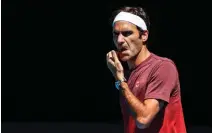  ?? RITCHIE TONGO EPA ?? ROGER FEDERER may be the best equipped to stop top seed and raging favourite Novak Djokovic at the Australian Open. |