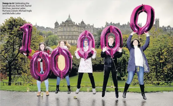  ??  ?? Jump to it Celebratin­g the landmark are, from left, Rachel McGhee, Jasmine Latter, Rumasia Zubairi, Michael Inglis and Michelle Latter