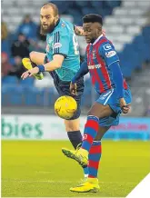  ??  ?? ■ Hamilton’s Georgios Sarris challenges ICT’s Larnell Cole.