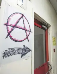  ?? ERNEST DOROSZUK / POSTMEDIA NEWS FILES ?? The city of Hamilton’s removal of an anarchist symbol, the circle-a, may have violated the Charter of Rights.