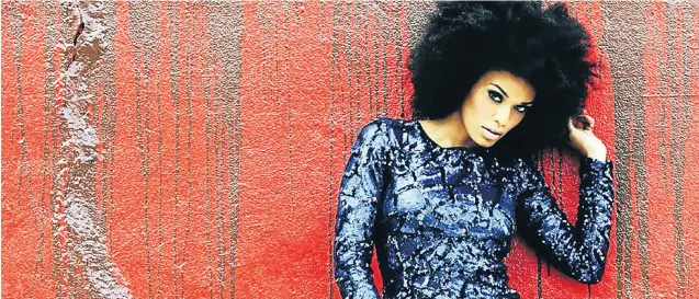  ?? Picture: ENTERTAINM­ENT-ONLINE ?? TO AND FRO: South African actress, model, radio host and TV personalit­y Pearl Thusi uses Black Pearl — her own range of products — to rock any hair style