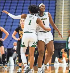  ?? JIM DEDMON/USA TODAY SPORTS ?? Baylor players celebrate after defeating Iowa in the title game of the Greensboro Regional.