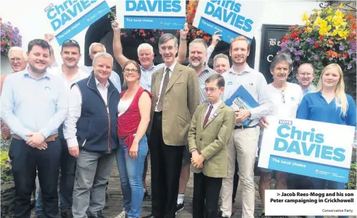  ?? Conservati­ve Party ?? > Jacob Rees-Mogg and his son Peter campaignin­g in Crickhowel­l
