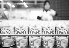  ??  ?? F&N is set to enhance its production capabiliti­es following its recent investment in an Aseptic Cold-Filling line for PET bottles from a leading Japanese bottling system manufactur­er. — Reuters photo