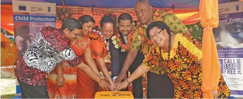  ??  ?? From left: Empower Pacific clinical psychologi­st, Dr Ravindra Prajapati, Shobana Indal, Dr Raape Diege, lawyer John Prasad with Tevita Mau and Unaisi Lekenaua at the Soqosoqo Vakamarama car park in Labasa on December 10, 2019.