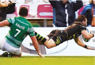  ??  ?? Star man: Cobus Reinach dives in to score Saints’ first try