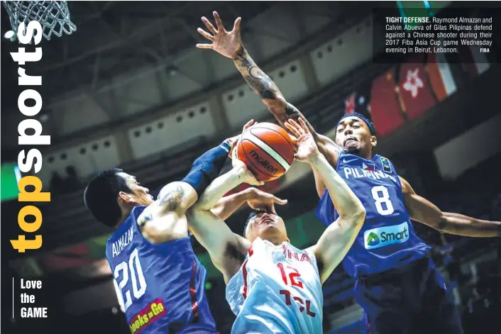  ?? FIBA ?? TIGHT DEFENSE. Raymond Almazan and Calvin Abueva of Gilas Pilipinas defend against a Chinese shooter during their 2017 Fiba Asia Cup game Wednesday evening in Beirut, Lebanon.