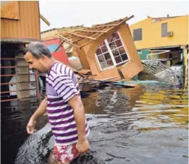  ?? AFP ?? Viviendas destruidas por el huracán María en la localidad de Catano, Puerto Rico, el 21 de setiembre del 2017.