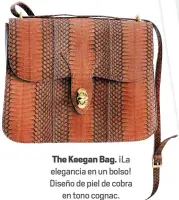  ??  ?? The Keegan Bag. ¡La elegancia en un bolso! Diseño de piel de cobraen tono cognac.