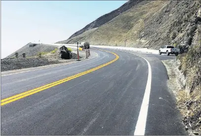  ??  ?? This stretch of Highway 1 along the California coast has been rebuilt and reopened for traffic Wednesday near Big Sur, Calif.