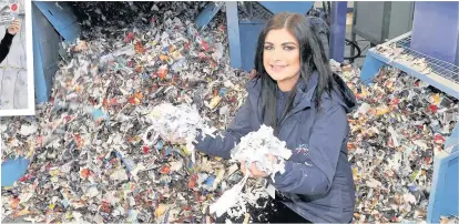 ??  ?? Secure Tracey Edgar, security shredding manager shows the finished product from the shredder