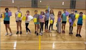  ?? SUBMITTED ?? Girls on the Run Avon team with their thank you bags.