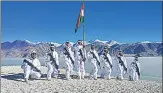  ?? PTI ?? Indo Tibetan Border Police personnel celebrate Republic Day near the bank of Pangong Tso, in Ladakh on January 26, 2021.