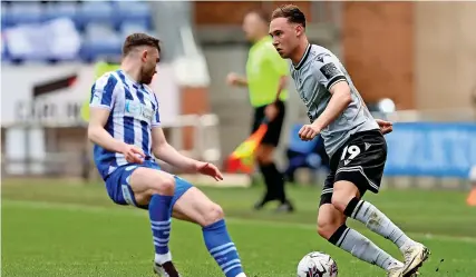  ?? Picture: Paul Greenwood/EFL ?? Harvey Vale on the ball for Bristol Rovers in last Saturday’s 2-0 defeat at Wigan