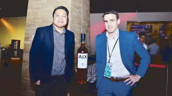  ??  ?? PLDT VP and HOME marketing head Gary Dujali and Straits Wine Company GM Julian Gagliardi.